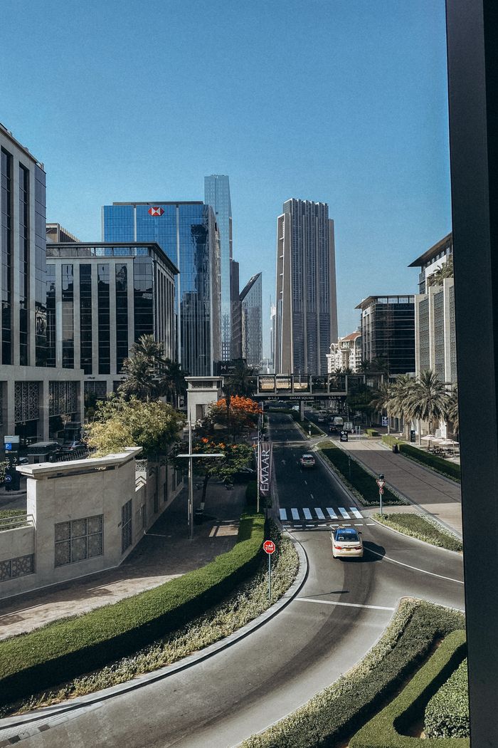 Mastering the First Impression: Your intriguing post title goes here A vibrant urban cityscape featuring towering skyscrapers and bustling street activity.